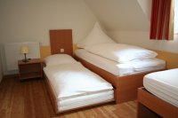 Schlafzimmer im Musterhaus des 5. Bauabschnitts im Seepark Burhave an der Nordsee