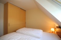 Schlafzimmer im Musterhaus des 5. Bauabschnitts im Seepark Burhave an der Nordsee